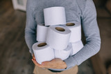 Fototapeta Morze - People are stocking up toilet paper for home quarantine from crownavirus.