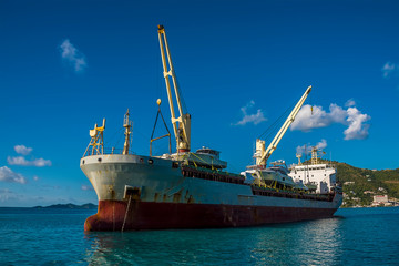 Wall Mural - A cargo vessel moored of Road Town in Tortola