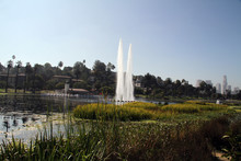 In City Park With Lake Has Three Water Fall Peaks
