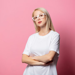 Wall Mural - Blonde woman in white moch-up tshirt and glasses