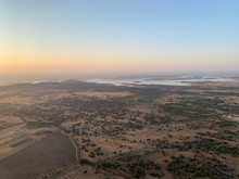 Hot Air Balloon Flight At Sunrise, Aerial View Over The Great Alqueva Lake, In Alentejo, Portugal