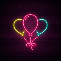 Balloons neon sign. Three glowing balloons design for celebration and decoration isolated on brick wall background. Concept of happy birthday, anniversary and wedding. Vector illustration.