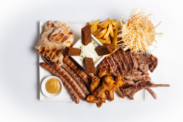 Wall Mural - Isolated grilled meat and beer appetizers platter