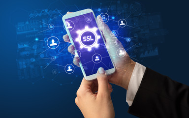 Poster - Female hand holding smartphone with SSL abbreviation, modern technology concept