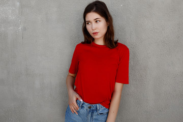 Wall Mural - shot of stylish young asian woman against grey background.