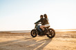 © Drobot Dean - Beautiful young stylish couple enjoying ride on a motorbike