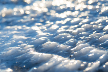 Wall Mural - Road covered with ice in the headlights.