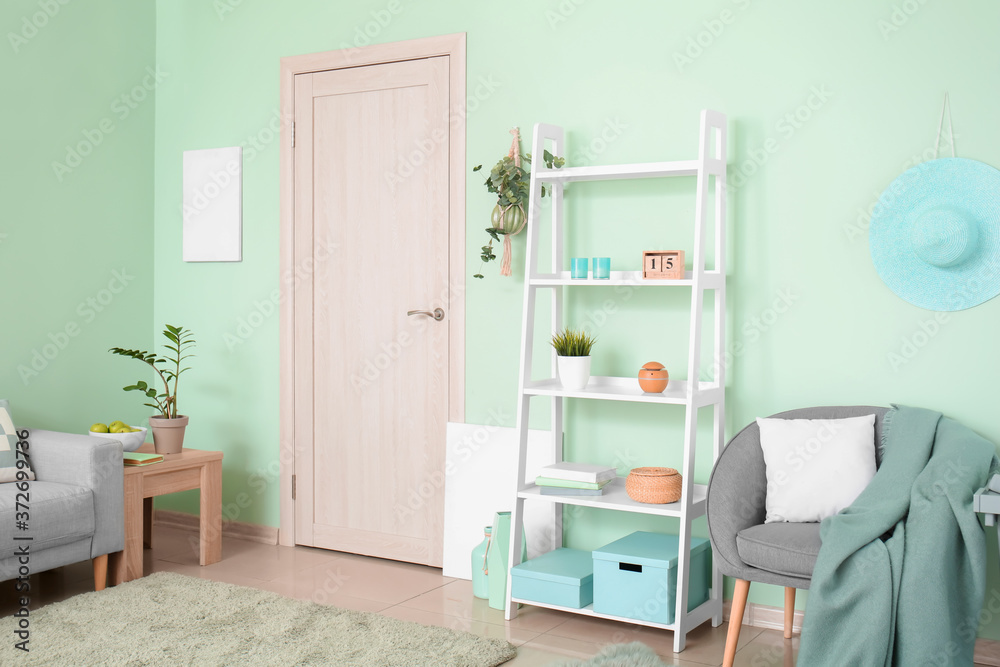 Interior of room with stylish mint wall