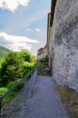 Poster - narrow street in Switzerland near the castle