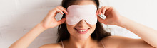Horizontal Image Of Woman Touching Pink Eye Mask