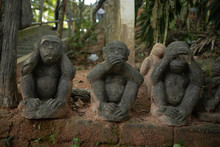 Three Statues Of Monkeys. Symbolism With The Concept Of Not Seeing Evil, Not Hearing Evil, Not Speaking Evil.