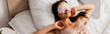 © LIGHTFIELD STUDIOS - panoramic concept of young woman in eye mask lying on bed