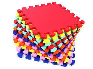 Fototapete - puzzle mat - multicolored soft elements letters and numbers on a white background