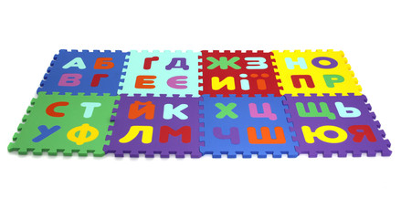 Fototapete - puzzle mat - multicolored soft elements letters and numbers on a white background