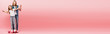 © LIGHTFIELD STUDIOS - horizontal image of mother supporting daughter standing on penny board by holding her hands on pink