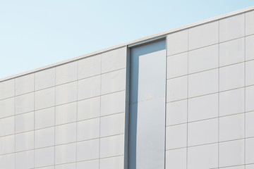 Poster - Urban modern architecture. Close up of a contemporary office building exterior.