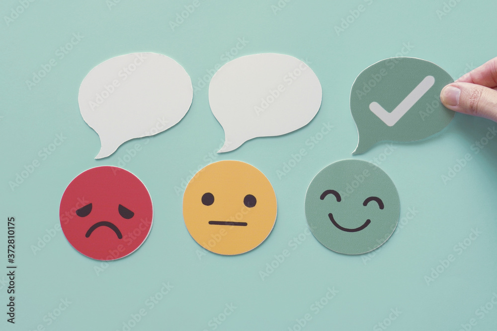 Hand choosing green tick paper cut, feedback rating and positive customer review, experience, satisfaction survey ,mental health assessment concept