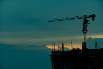 Wall Mural - silhouette crane for building, worker, concrete and equipment
