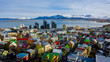 Aerial view of colorful buildings in Reykjavik Iceland with mountains and clouds in the background