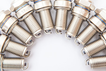 Spark plug composition on white background