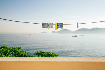 Wall Mural - Colorful clothespins with seascape at Huinnyeoul Culture Village in Busan, Korea