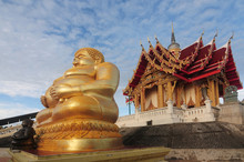 Golden Sitting Buddha Statue (Katyayana) At Wat Pa Phu Hai Long
