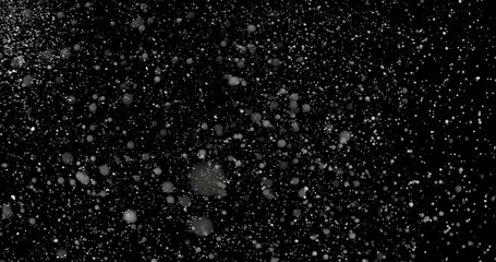 Wall Mural - falling snowflakes showcases infinite snowflakes falling over a black background. magical and myster