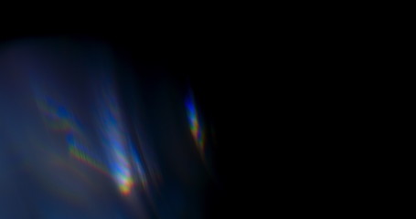 prism rainbow light flares overlay on black background