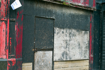 Sticker - Old abandoned building with colored door and walls