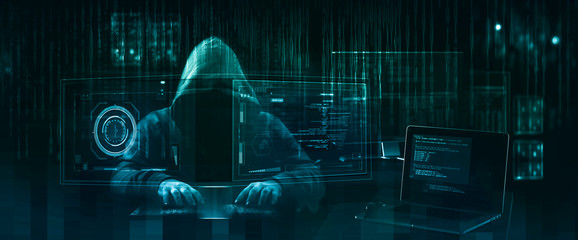 hooded hacker performing an security breach