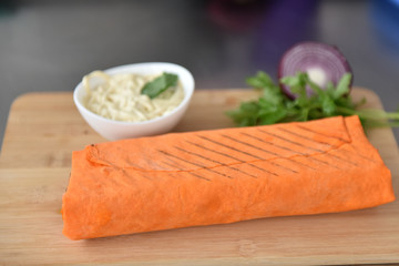 Wall Mural - kebab meat with vegetables on a wheat tortilla