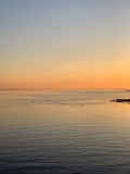 Fototapeta Miasto - sunset over the sea