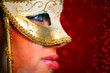 Young woman wearing a venetian mask
