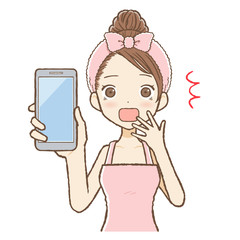 ルームウエアを着た女性がスマホを持って驚いている　上半身