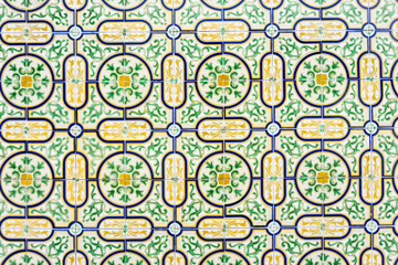 Vintage tiles with geometric and floral borders in vivid colo