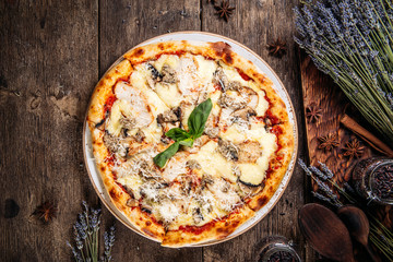 Wall Mural - Italian fresh baked fluffy pizza with mushrooms