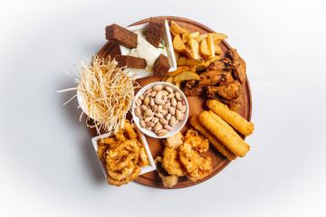 Wall Mural - Isolated beer platter with chicken onion rings