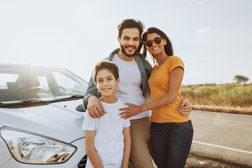 Family road trip. Latin family traveling locally by car.