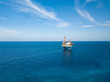 © bomboman - Aerial view from a drone of an offshore jack up rig at the offshore location during day time