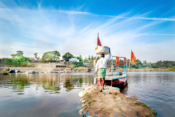 Crossing the little river in Hampi, India. 