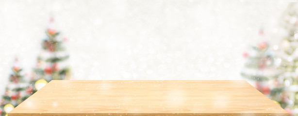 Aufkleber - Perspective wood table with blur Christmas tree decorate string light and blue bokeh with snow light.Panoramic wooden countertop banner mock up for product display greeting card design online content