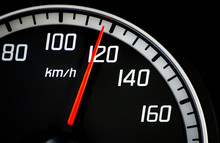 Speedometer with a red needle pointing