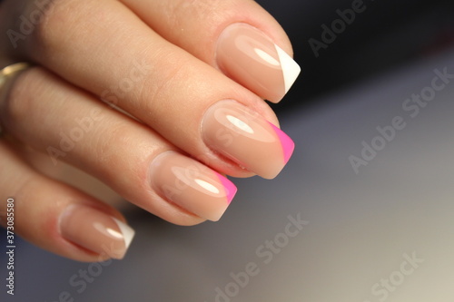Trendy manicure design on a beautiful background. Canvas