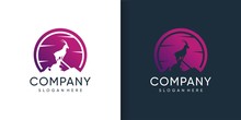 Goat Logo Standing In The Mountain With Silhoutte Concept Premium Vector