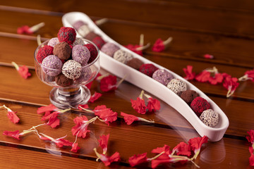 Sticker - High angle shot of colorful gourmet chocolate balls on a romantic valentines table