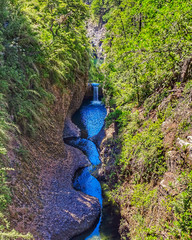 Wall Mural - Aerial shot of an amazing waterfall in Radal Siete Tazas National Park, Chile