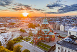 Fototapeta Miasto - The Uspenski Cathedral, St Nicholas' Church, beautiful sunset on the background, Helsinki, Finland.