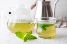 Green Hot Mint Tea In Glass Cup