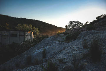 Wall Mural - Beautiful shot of an old building in a hilly landscape