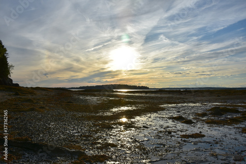 Fotografía Sun Setting Over Tidal Beach in Casco Bay